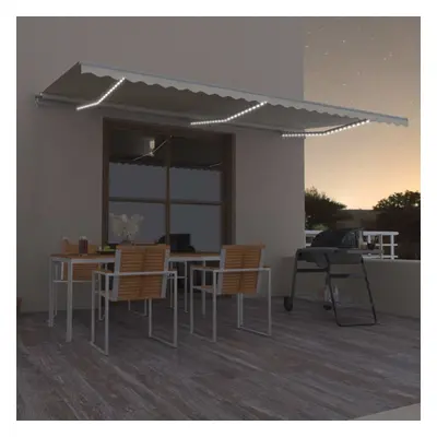 vidaXL Toldo retrátil manual com LED 600x300 cm cor creme